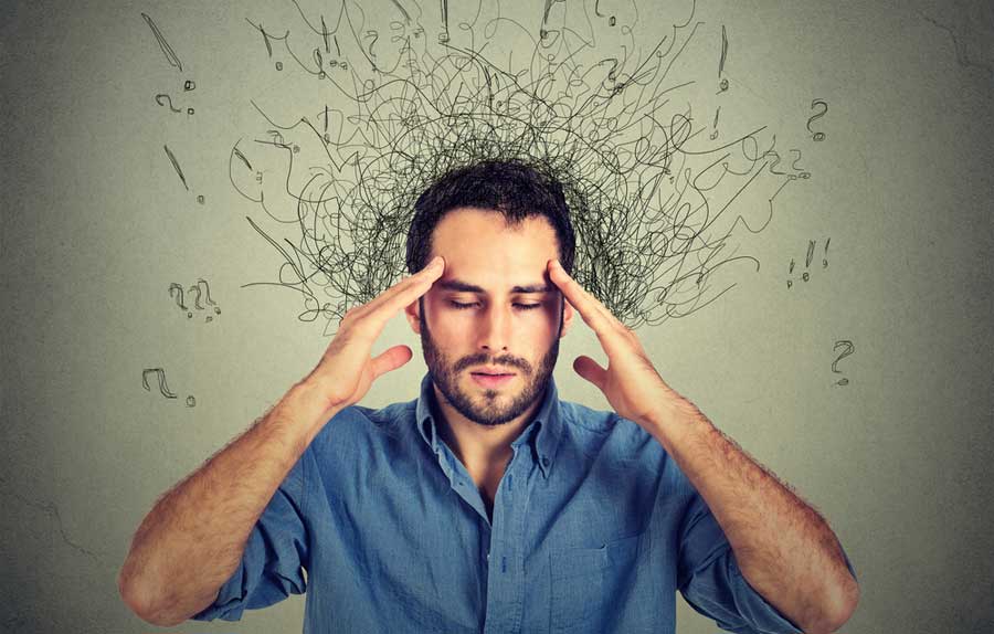 An image of a man thinking and questioning his ego.